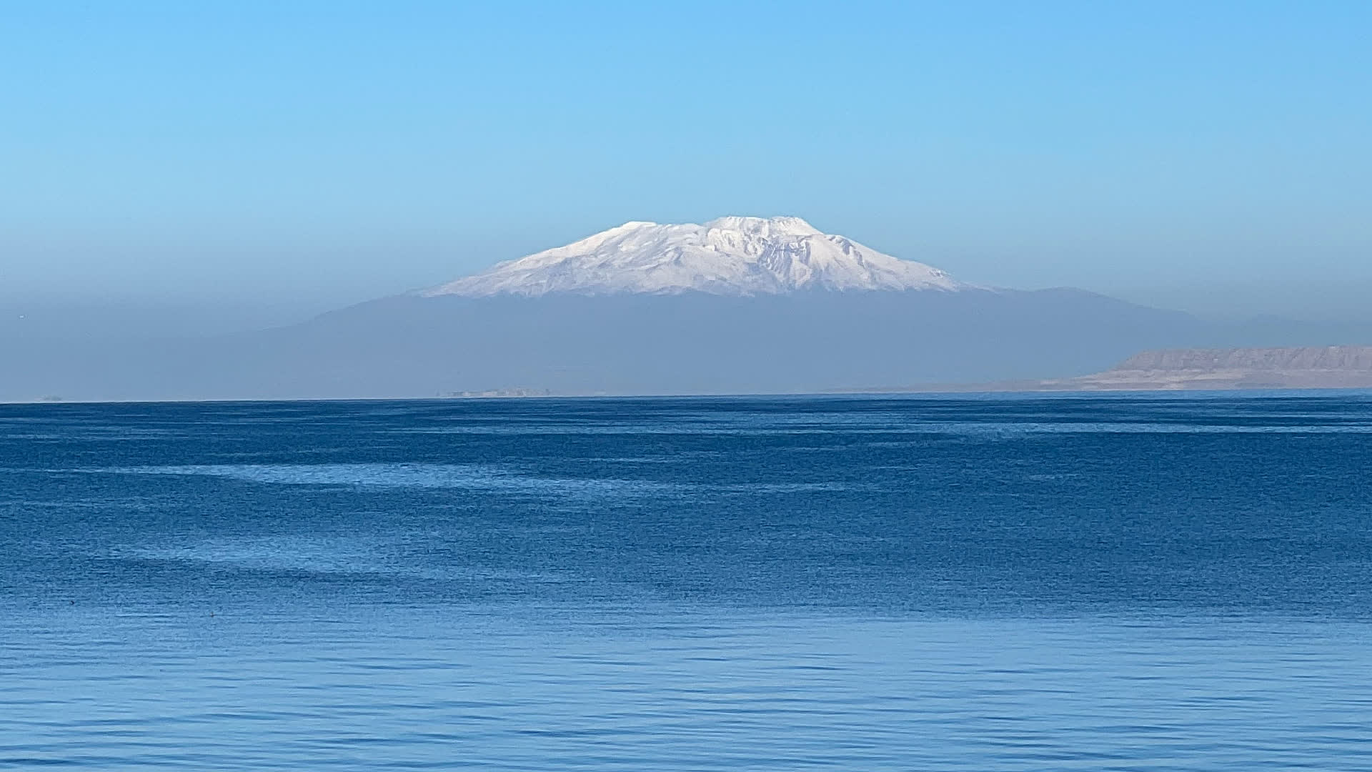 Snow-capped Süphan Dağı rising above Lake Van in eastern Türkiye